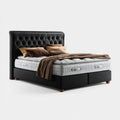 Letto matrimoniale continentale nero 180 x 200 cm con materasso a molle insacchettate testiera imbottita rettangolare in poliestere